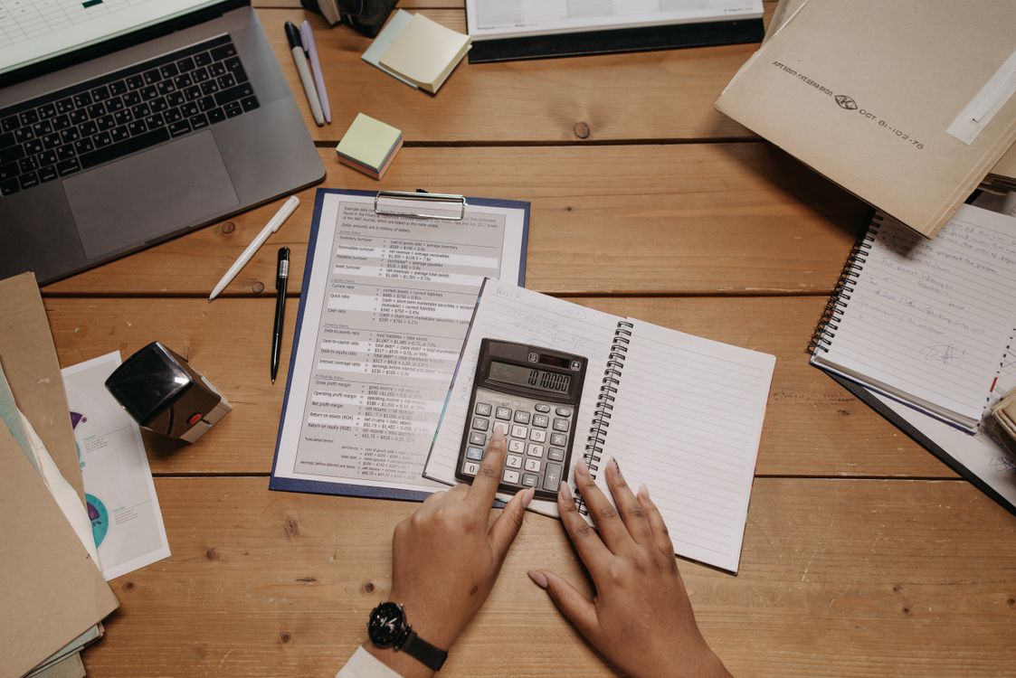 UAE gratuity after 10 years - calculator and salary documents on a desk